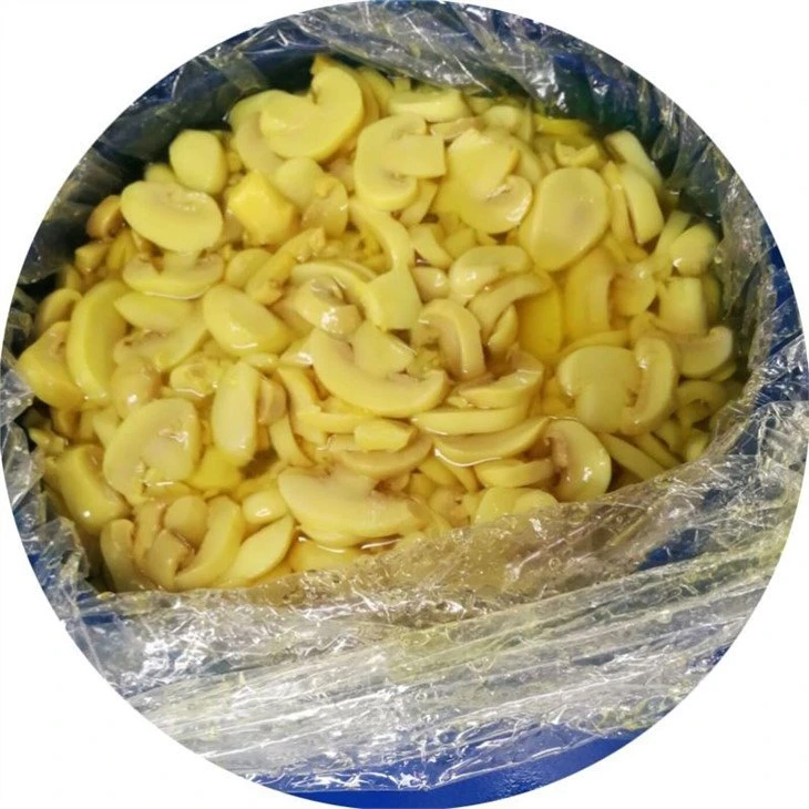 Sliced champignon mushroom in brine in plastic drums